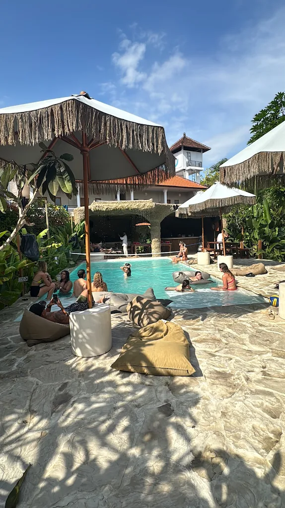 Guests enjoying sunset from rooftop